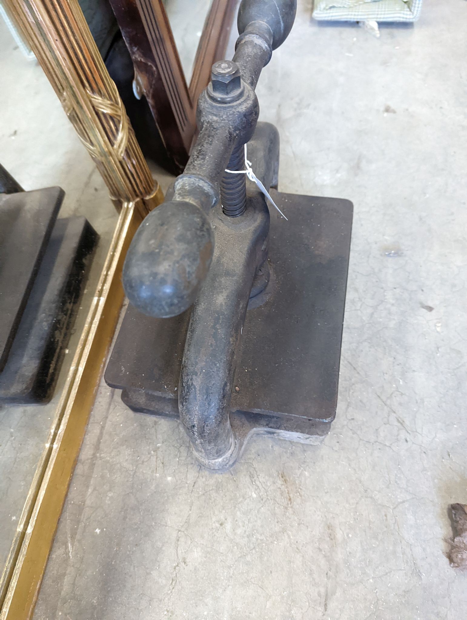 A Victorian cast iron book press, width 40cm, height 36cm